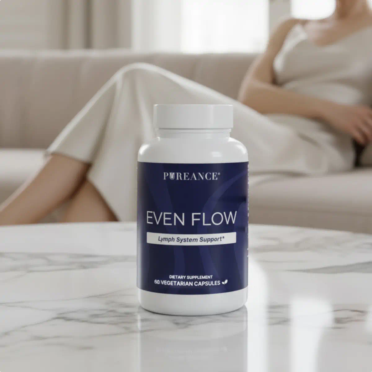 Even Flow lymphatic support supplement bottle displayed on a table