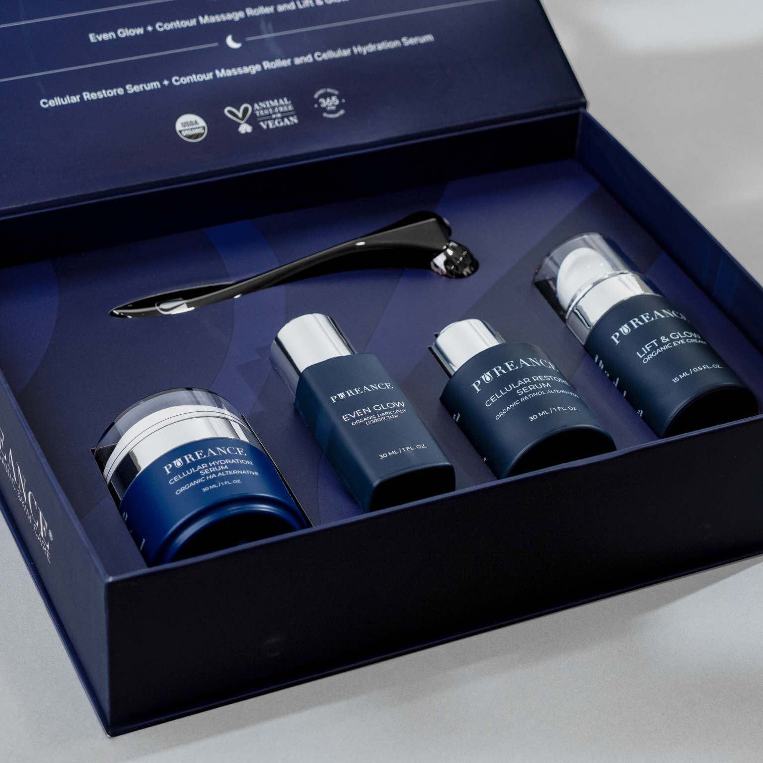 Pureance skincare set with four bottles and a roller