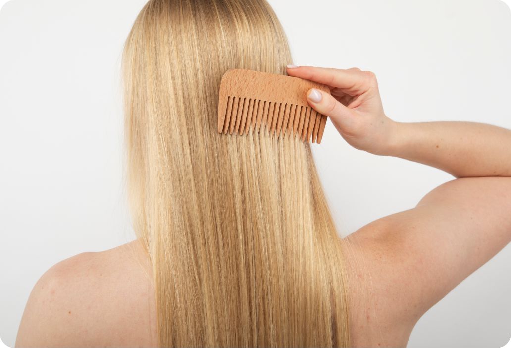 woman brushing her hair