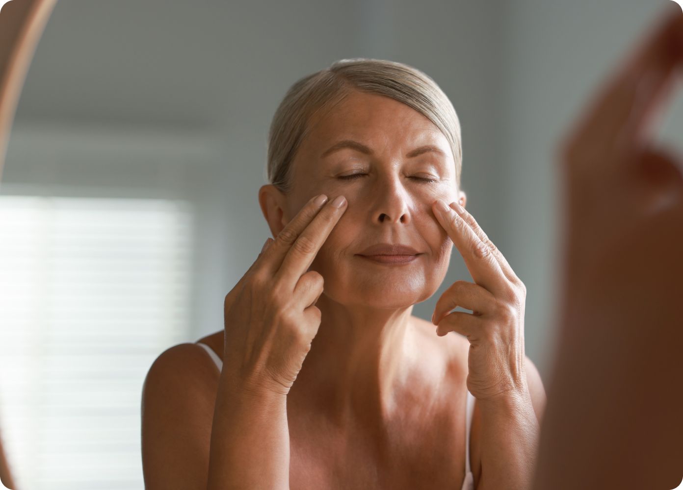 woman applying serum