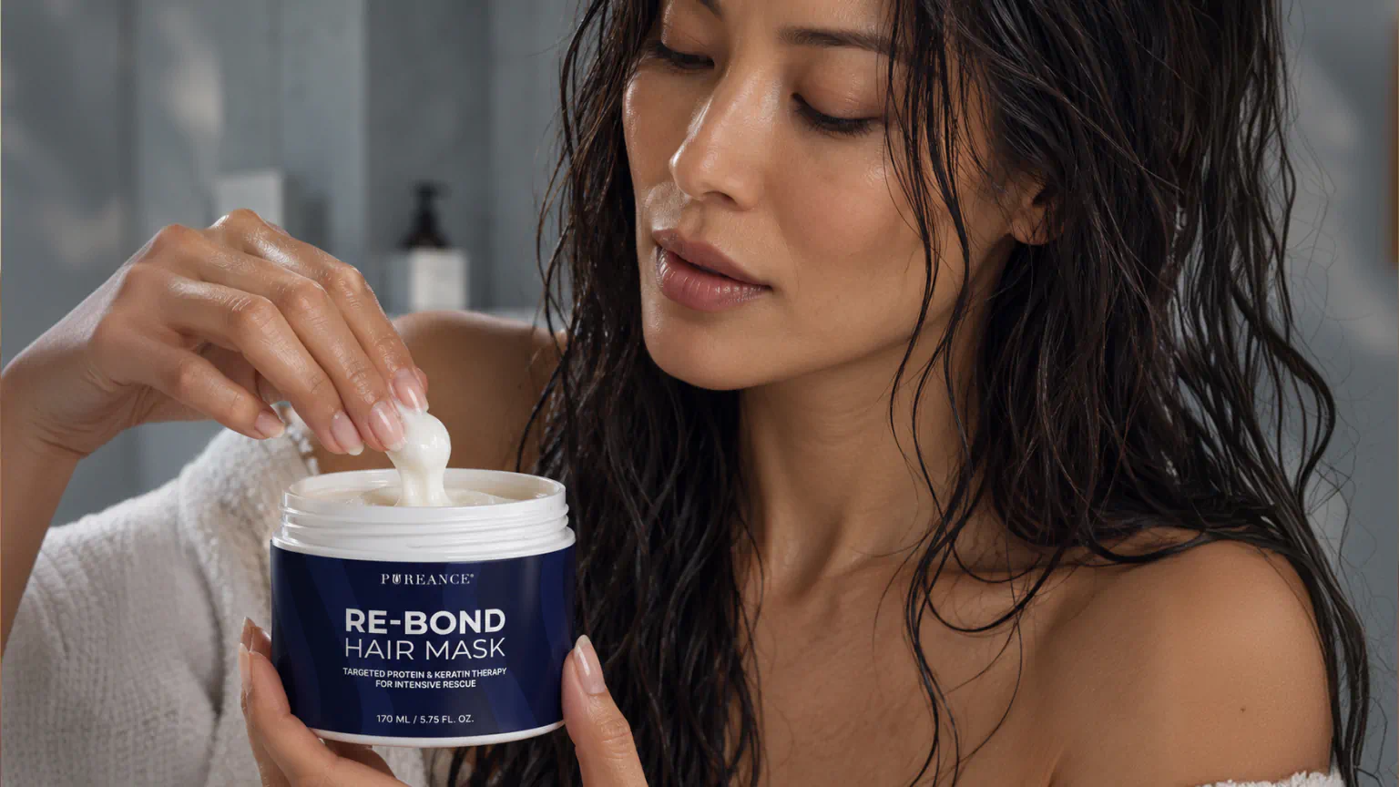 Woman with wet hair applying Pureance keratin hair mask